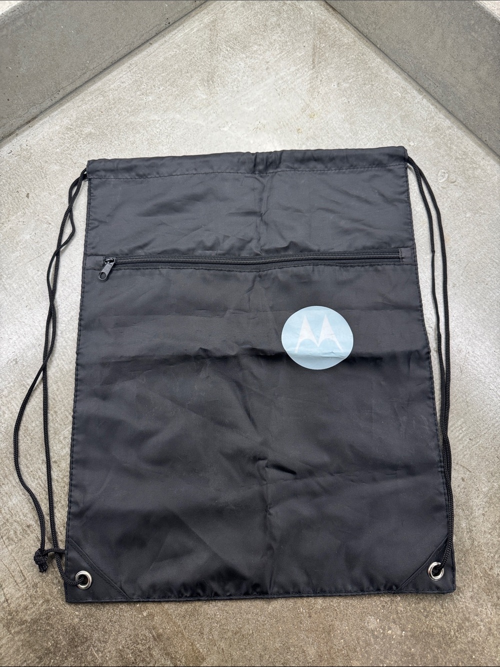 Motorola Black Drawstring Backpack with Front Zip and Logo Patch